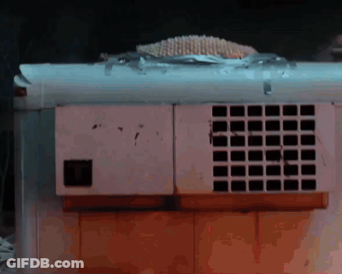 White Box With Squares Taped To Ceiling GIF