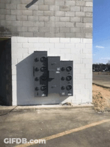 White Brick Wall With Boxes GIF