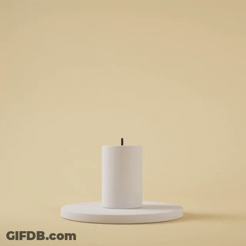 White Candle With Yellow Flame GIF