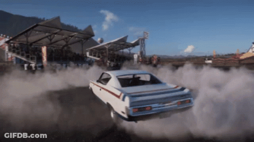 White Car Drifting On Race Track GIF