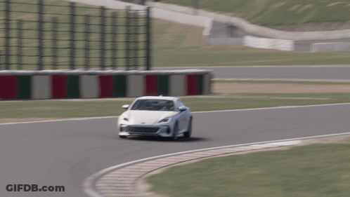 White Car Driving On Race Track GIF