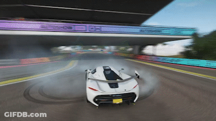 White Car Driving Under Bridge Saying Autoshow GIF