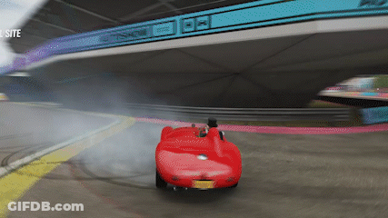 White Car Driving Under Bridge With Autoshow Sign GIF