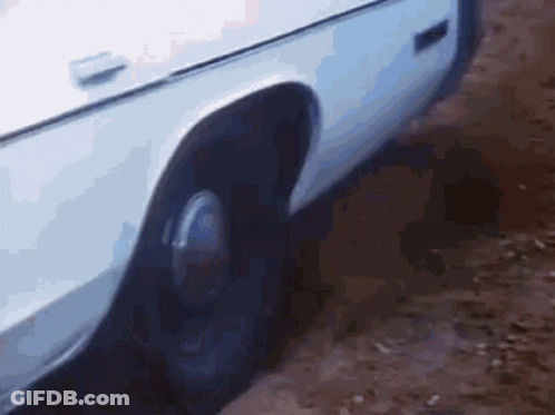 White Car Fender And Wheel Close Up GIF