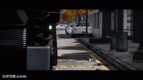 White Car Parked By Roadside Trash Can GIF