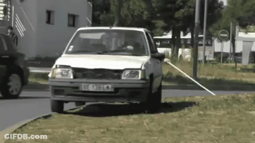 White Car With License Plate BE 138 LM GIF