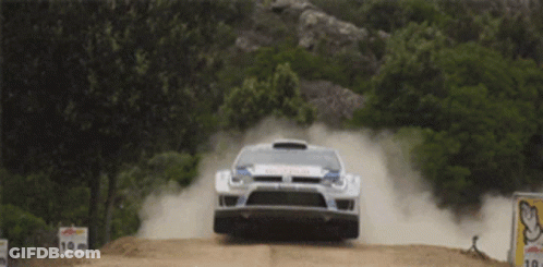 White Car With Red Bull Text Jumping GIF
