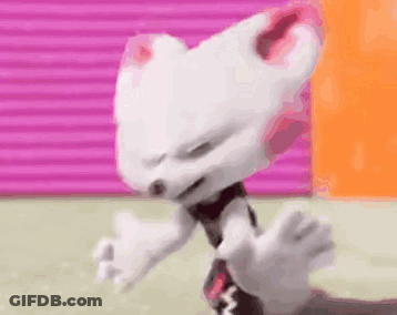 White Cartoon Character Making Funny Face Against Pink Wall GIF