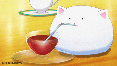 White Cat Drinking From Glass With Straw GIF