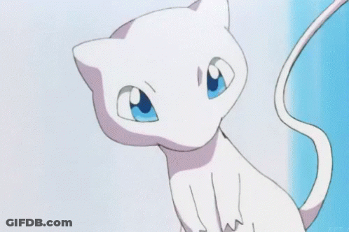 White Cat With Blue Eyes Sitting On Blue Surface GIF