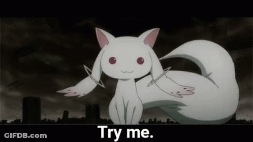 White Cat With Wings Saying Try Me GIF