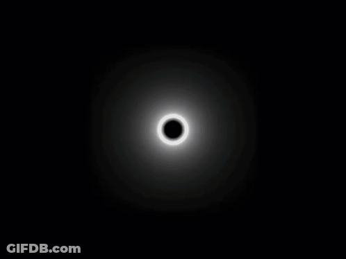 White Circle With Black Hole GIF