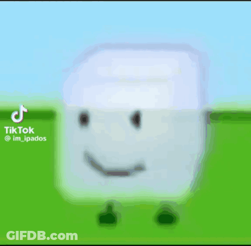 White Cube With Smiley Face In Field GIF
