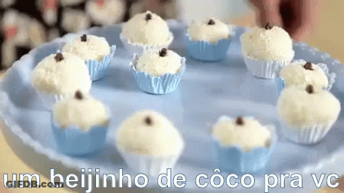 White Cupcakes Saying Um Beijinho De Coco Pra Vc GIF