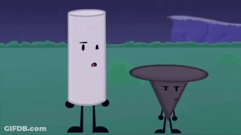 White Cylinder And Black Cone In Grass GIF