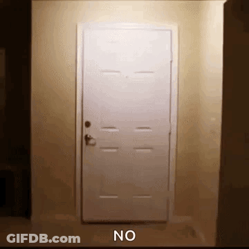 White Door In Dark Room Saying No GIF