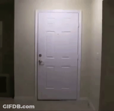 White Door Open In Hallway With Light GIF