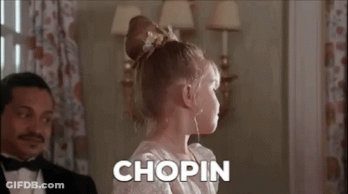 White Dress Girl Playing Piano, Tuxedo Man Watching GIF