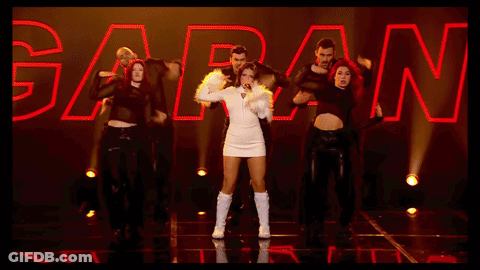 White Dress Woman Singing With Dancers Word Gaban GIF