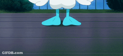 White Duck With Blue Eyes And Yellow Beak Standing On Railing GIF