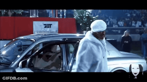 White Fur Coat Man Approaches Southern Classics Car GIF