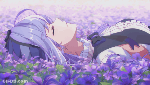 White-Haired Girl Laying In Purple Flower Field GIF