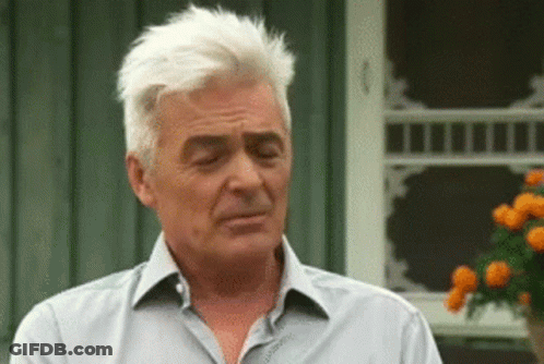 White Haired Man On Screened Porch GIF
