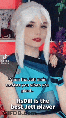 White-Haired Woman In Blue Shirt And Gloves GIF