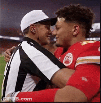 White Hat Man Hugging Red Uniform Player GIF