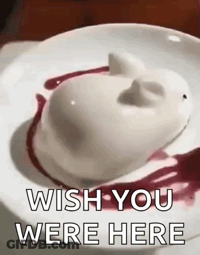 White Heart-Shaped Dessert With Red Sauce GIF