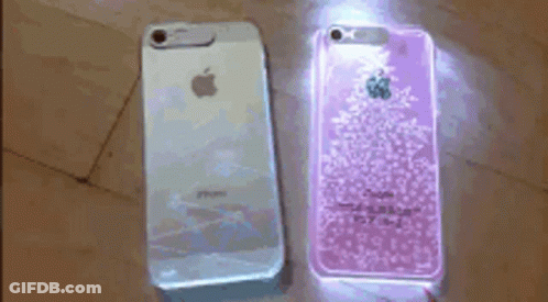 White IPhone Next To Purple IPhone GIF