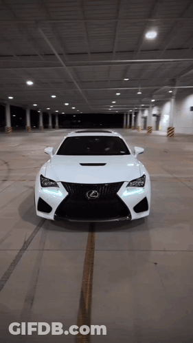 White Lexus Sports Car Parked In Parking Garage GIF