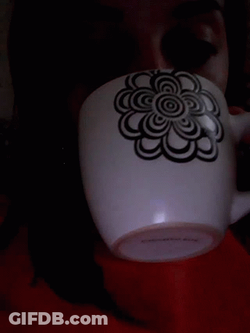 White Mug With Black And White Flower GIF