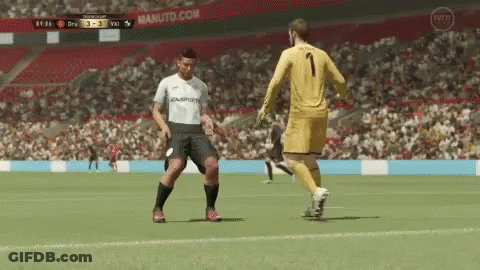 White Number 1 Soccer Player Beside Yellow Goalie GIF