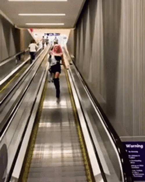 White People Escalator Falling Fail GIF