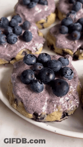 White Plate With Blueberries And Purple Frosting GIF