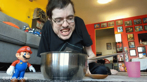 White Plate With Pink Jelly And Spoon GIF