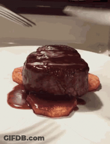 White Plate With Steak And Sauce GIF