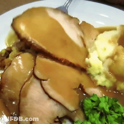 White Plate With Turkey Mashed Potatoes Gravy And Green Peas GIF
