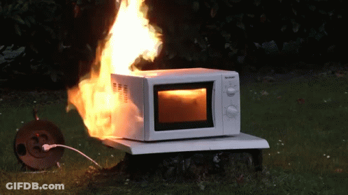 White Sharp Microwave On Fire GIF