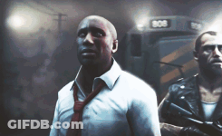 White Shirt And Red Tie Man Beside Black Leather Jacket Man GIF