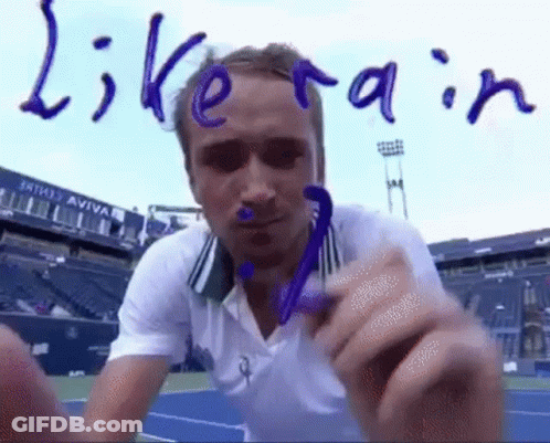White Shirt Man Holding Purple Object Sign Like Rain GIF