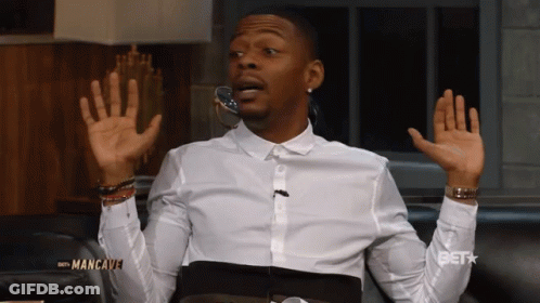 White Shirt Man On Couch Screen Saying Get GIF