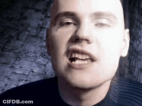 White Shirt Man Sitting In Car Crossed Legs GIF