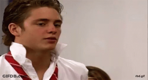 White Shirt Red Tie Man Looking At Camera GIF