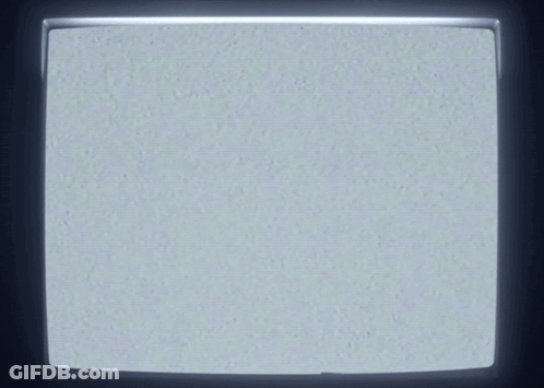 White Smiley Face On Black Background GIF