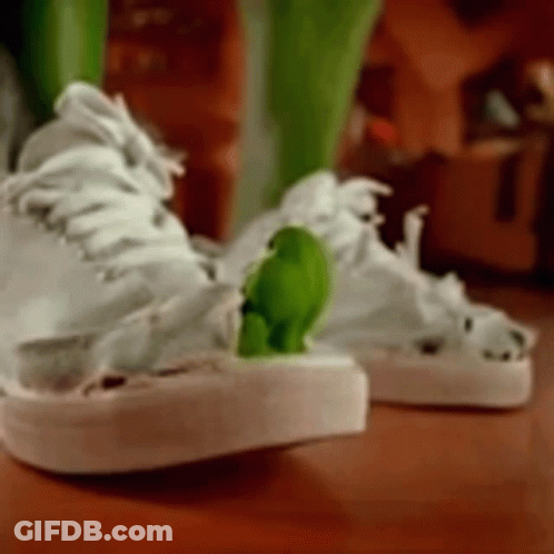 White Sneakers With Green Frog GIF