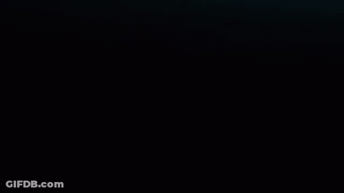 White Spider Logo On Black Background GIF