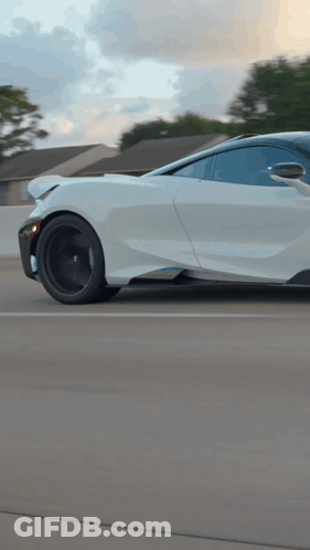White Sports Car Driving Highway GIF