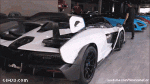 White Sports Car In Garage GIF